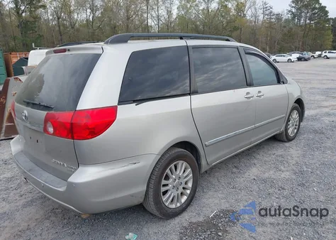2009 Toyota Sienna Limited z USA, uszkodzony, nr VIN 5TDBK22C69S027364